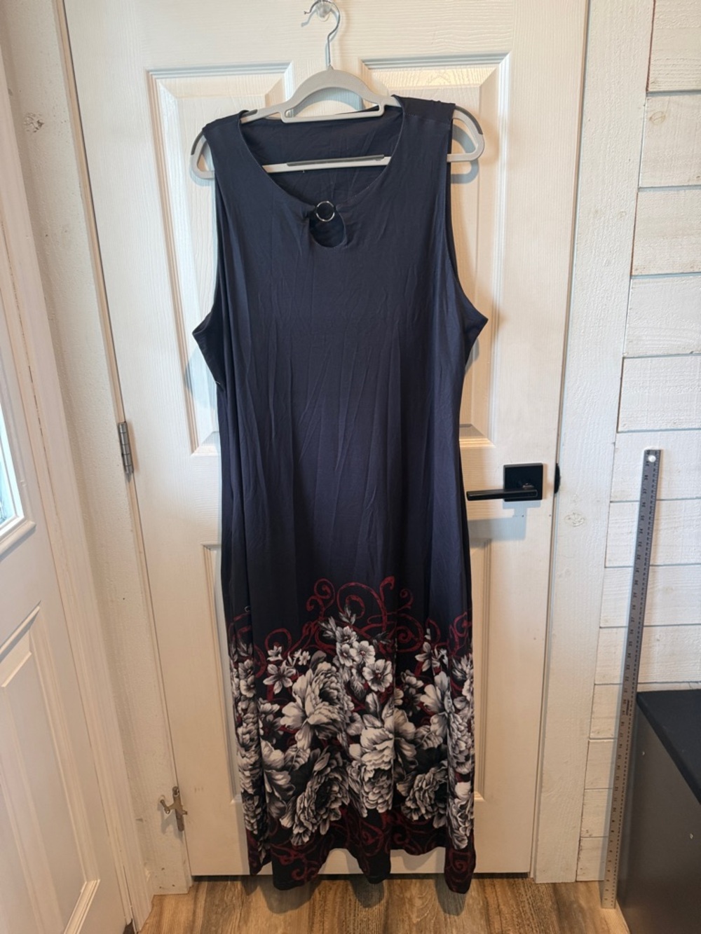 Sleeveless Navy Maxi Dress with Floral Hem and Ring Detail